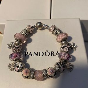 Pandora pink bead bracelet with charms